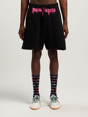 Sprayed Logo Sweatshorts in BLACK - FUCHSIA for Men