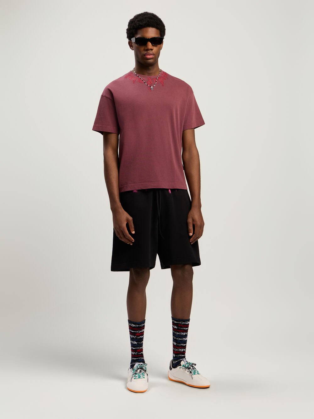 Sprayed Logo Sweatshorts in BLACK - FUCHSIA for Men