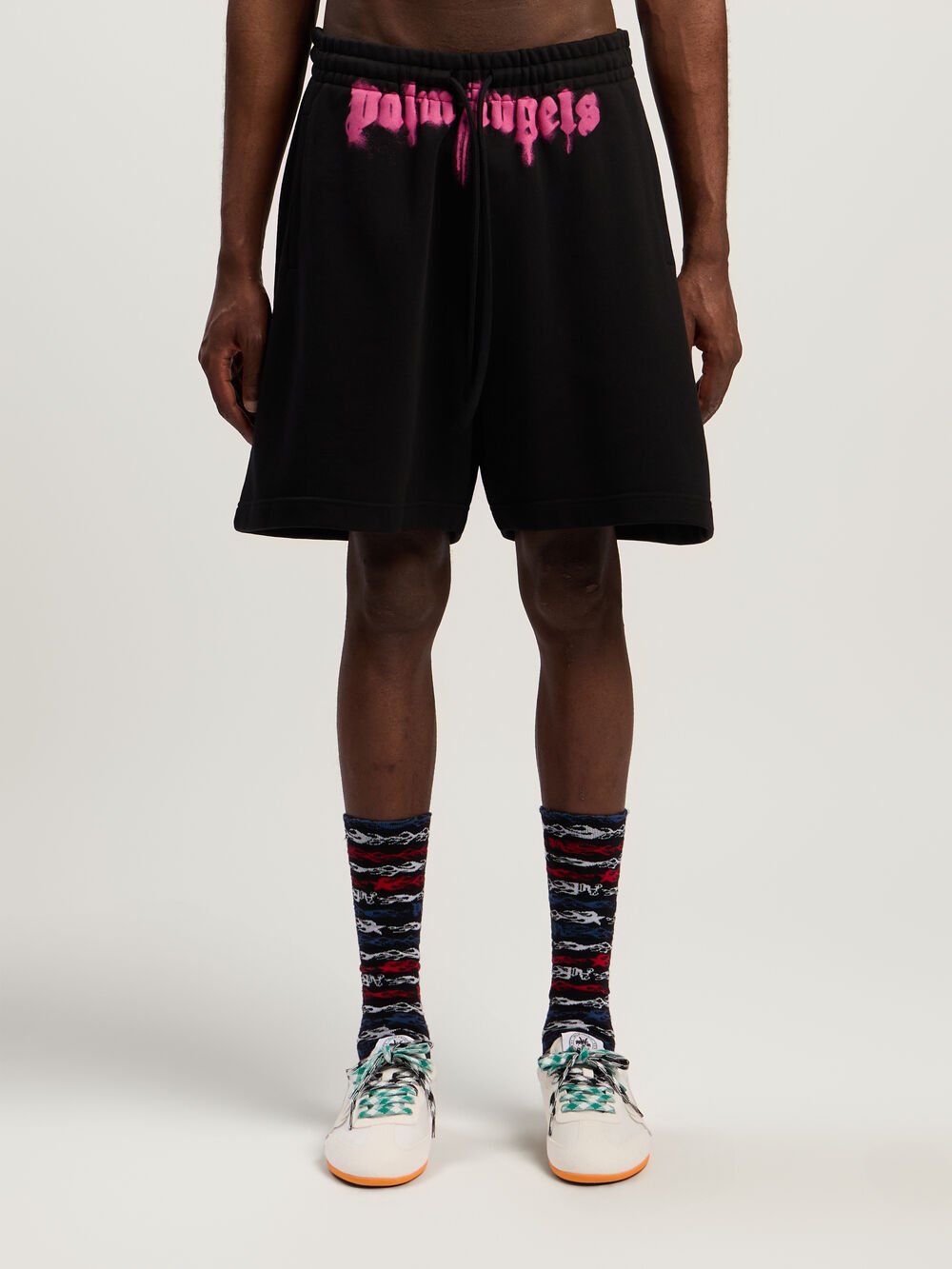 Sprayed Logo Sweatshorts in BLACK - FUCHSIA for Men