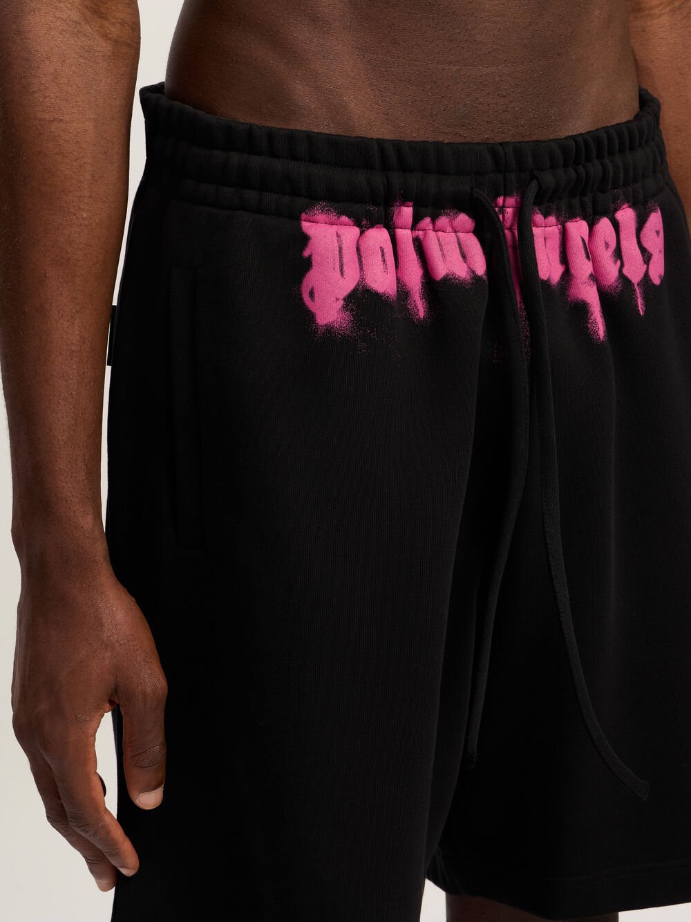 Sprayed Logo Sweatshorts in BLACK - FUCHSIA for Men